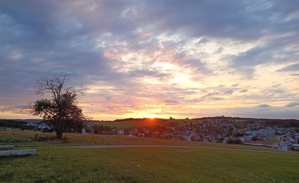 Sunset at the Meßstetten Blumersberg mobile home parking space, Swabian Alb